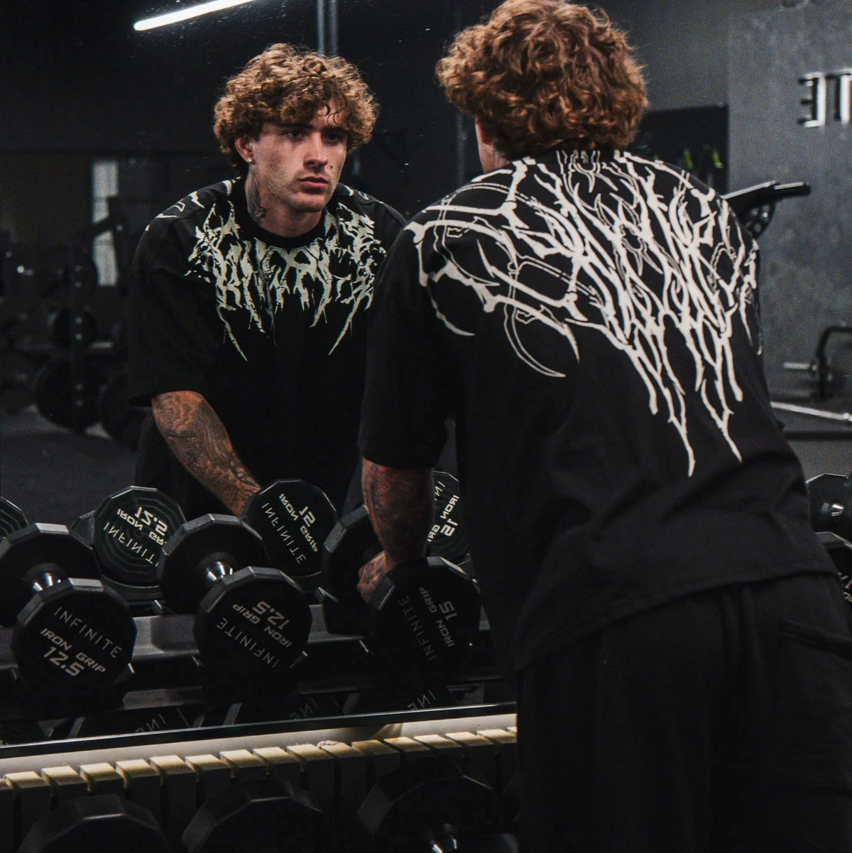 Oversized T-shirt with a lone shadow print.
