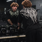 Oversized T-shirt with a lone shadow print.