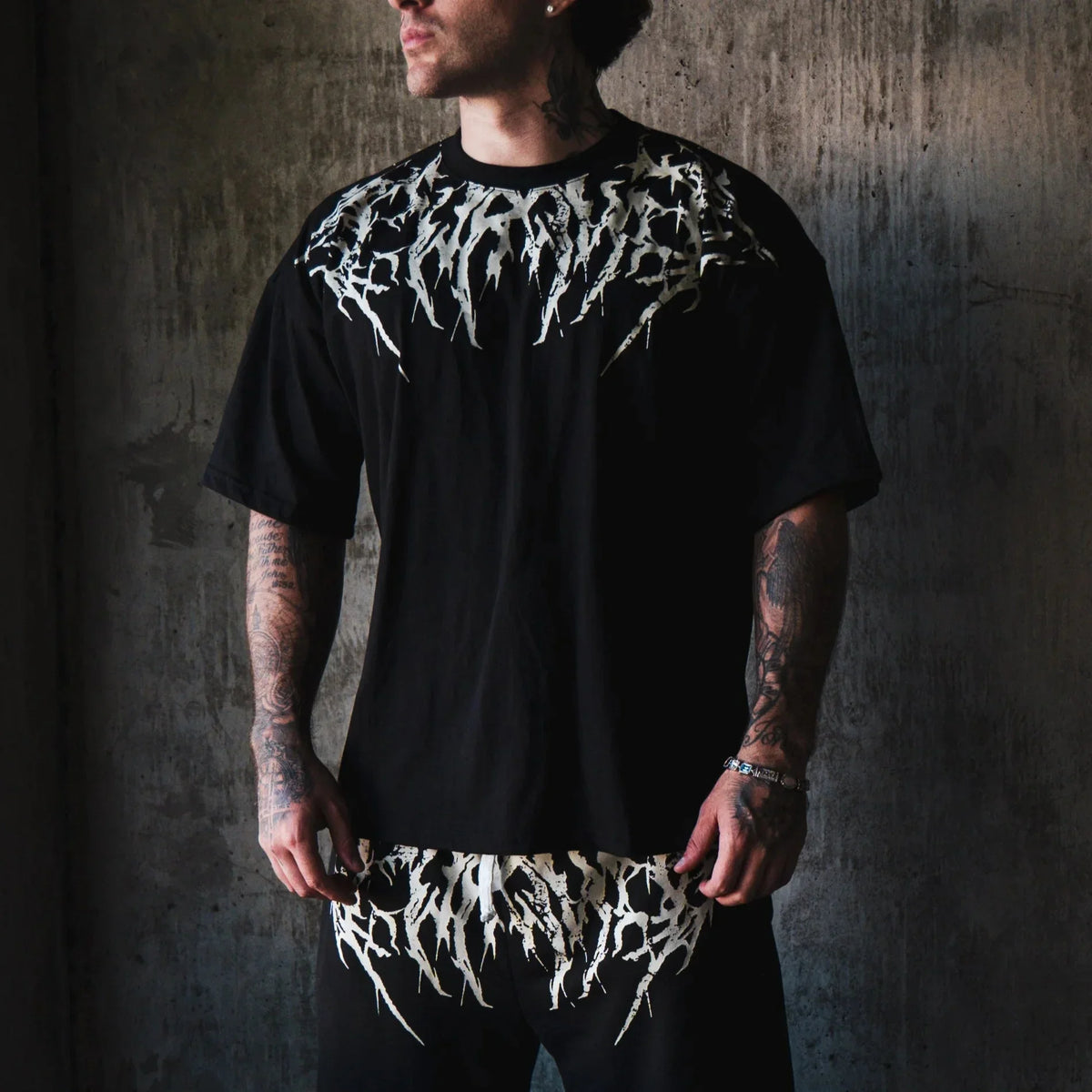 Oversized T-shirt with a lone shadow print.