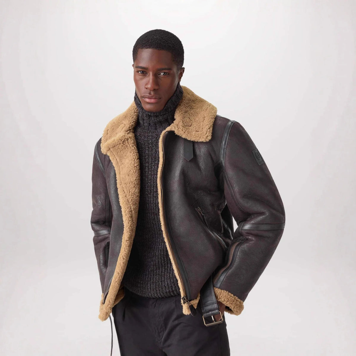 Leather and faux fur long-sleeved jacket for autumn and winter.